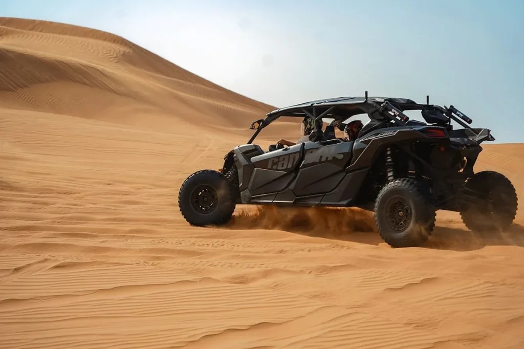 Sunrise dune buggy tour through the red dunes of Dubai